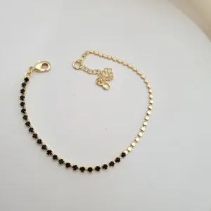 Pulseira metade cristal preto e metade bolinha