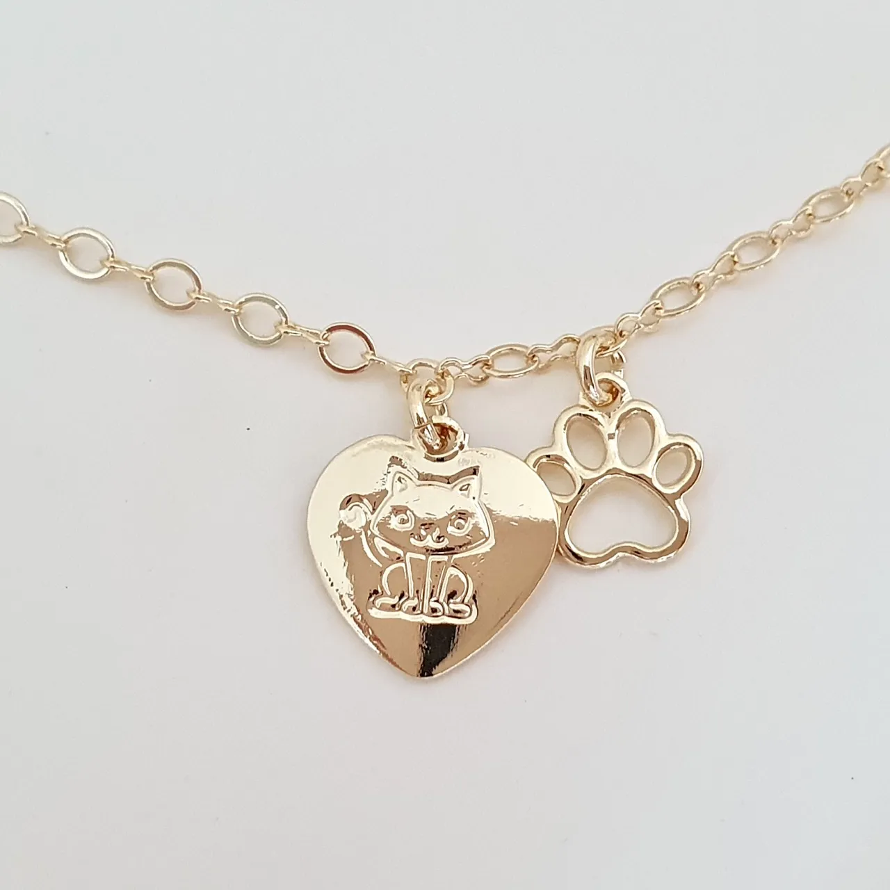 Pulseira coração gato e patinha